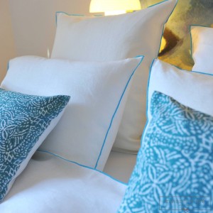 White washed linen pillow case with gray bourdon stitching