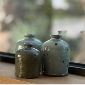 petit vase en argile vert